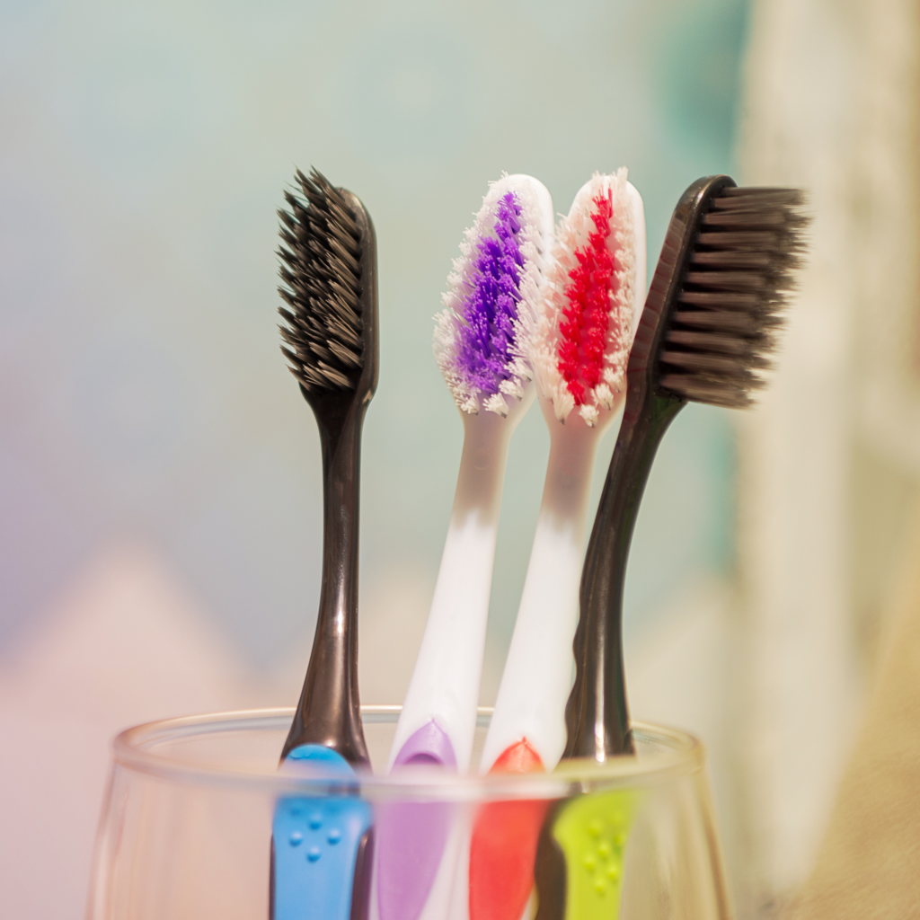 manual toothbrush's in cup