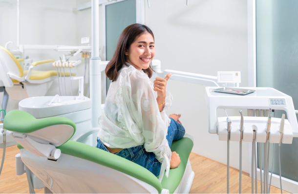 Lady sitting on dental chair